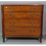 A Louis XVI style mahogany chest of four long graduated drawers on spiral twisted supports,