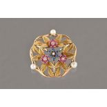 A gold, diamond, sapphire, ruby and cultured pearl set brooch, in a pierced foliate design,