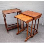 A nest of three Victorian pollard oak occasional tables on turned supports and scroll feet,
