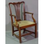 A George III style mahogany open armchair.