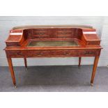 A George III style figured yew Carlton house desk,