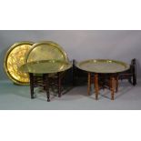 A group of four 20th century brass tray top tables, 78cm wide x 48cm high, (4).