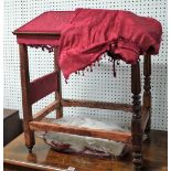A William IV mahogany miniature dog four poster bed, canopy top and tulip carved reeded columns,