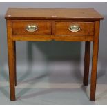 A late 18th century oak two drawer side table on block supports, 76cm wide x 73cm high.