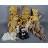 A group of seven early 20th century Teddy bears, a monkey, a cat and a rabbitt, (10).