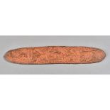 An Australian Aboriginal Tjuringa, carved geometric pattern, red painted detail, 40.5cm.