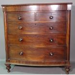A Victorian mahogany bowfront chest with secret drawer over two short and three long graduated
