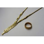 A 9ct gold necklace, in a triangular shaped scale link design, the front with pendant tassles,