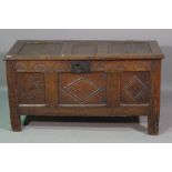 An 18th century panelled oak coffer, 108cm wide x 56cm high.