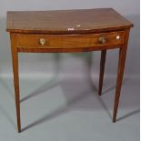 A 19th century mahogany bowfront single drawer side table on tapering supports,