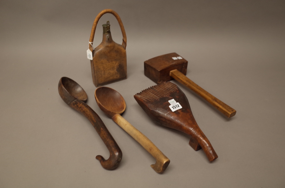 An unusual African hardwood combing tool (30cm), two wooden ladles,