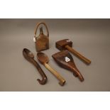 An unusual African hardwood combing tool (30cm), two wooden ladles,