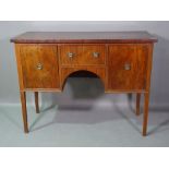 A 19th century three drawer sideboard, on tapering square supports, 121cm wide x 92cm high.