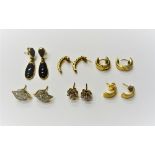 A pair of 9ct gold and diamond earstuds, each in a pierced twist design,