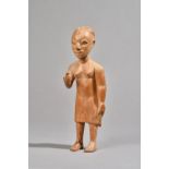 An Osei Bonsu carved Ashanti tribal wooden figure of a female native, (a.f.), 25.5cm high.