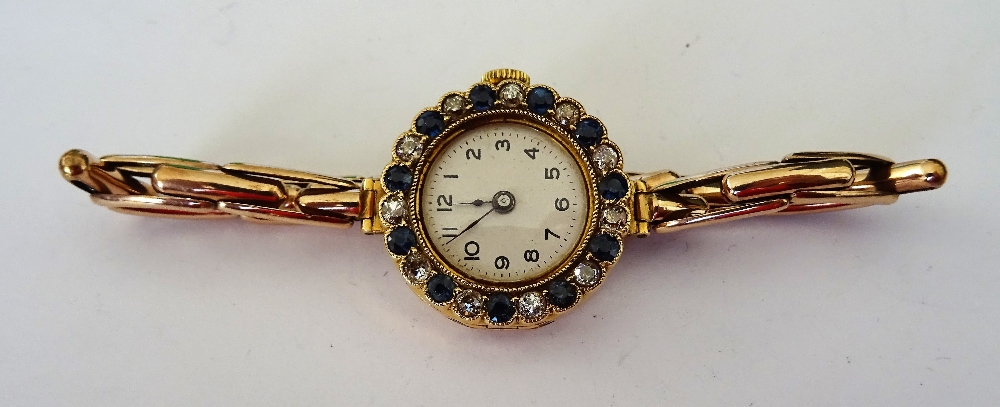 An 18ct gold cased, sapphire and diamond set lady's dress wristwatch,