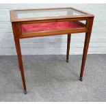 An Edwardian satinwood bijouterie table, on tapering square supports, 69cm wide x 72cm high.