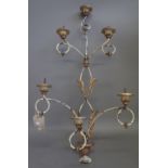 A pair of modern gilt and cream painted wrought iron and composite six branch wall appliques,