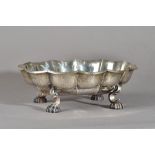 A shaped oval fruit or bread basket, of panelled form with martele decoration,