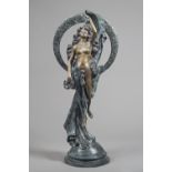 Untitled, patinated bronze, female nude under a foliate cast halo on a domed base, unsigned.