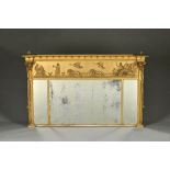 A Regency gilt triple plate overmantel mirror, with lion drawn chariot frieze and flanking columns,