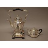 A spirit kettle, with a swingover handle and stand,