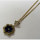 A gold, sapphire and diamond pendant,