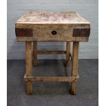 A square metal bound butchers block on pine base, 62cm wide x 82cm high.