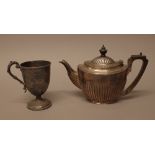 Silver, comprising; a teapot, of oval form, with partly fluted decoration, by Elkington & Co,