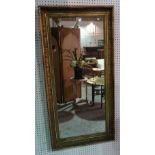 A late 19th century gilt framed rectangular mirror, with acanthus relief moulded decoration,