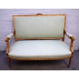 A Louis XVI style salon suite to comprise; an open arm sofa, 122cm wide x 100cm high,