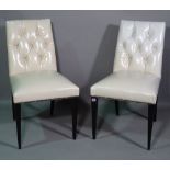 Baker; a set of seven 20th century dining chairs with white leather button back upholstery, (7).