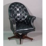 A 20th century mahogany framed tub back office armchair with black leather upholstery.