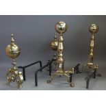 A pair of Victorian style brass andirons of turned globular form,
