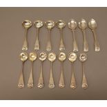 Silver flatware, comprising, three double struck, fiddle, thread and shell pattern salt spoons,