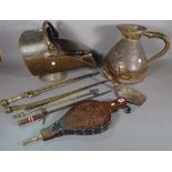 A wrought iron fire guard, a wrought iron fender, various fire tools,