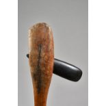 A Papua New Guinea hardstone mounted wooden axe with oversized naturalistic handle, 71cm.