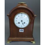 A mahogany cased arch top mantel clock, late 19th century,