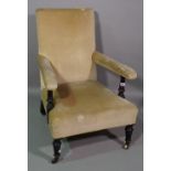 An Edwardian ebonised open armchair.