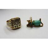 A gold and turquoise set brooch, designed as a cat with red gem set eyes,