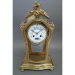 A French four glass mantel clock of waisted form, late 19th century,