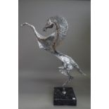 Untitled, Rearing Stallion, silvered alloy on a polished black marble square plinth, unsigned,