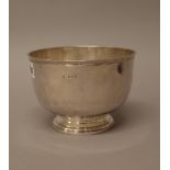 A late Victorian Britannia Standard silver bowl, raised on a circular foot, 16.