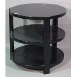 A 20th century black painted circular three tier side table, 61cm wide x 60cm high.