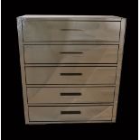 A Brighton mirrored glass chest of five long drawers 110cm wide x 128cm high.