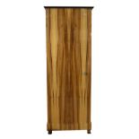 A pair of hardwood single door wardrobes on block supports, 72cm wide x 209cm high.
