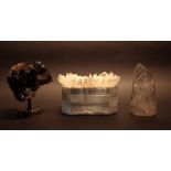 A fluorite veneered octagonal lidded box, with naturalistic quartz finials, 24cm wide,