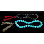 A Blue Jasper bead necklace formed of 30" beads and a similar hardstone necklace.