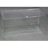 A Perspex side table, 74cm wide x 40cm high.