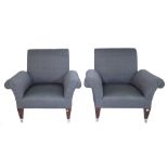 A pair of hardwood framed armchairs with rollover arms on tapering square supports,